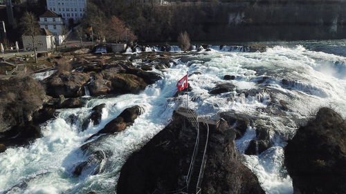 Panoramic view of river flowing through rocks