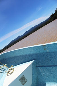 Close-up of blue water against sky