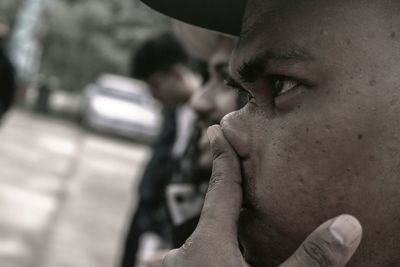 Close-up of thoughtful men