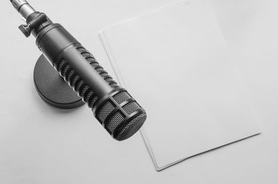 High angle view of pen on table against white background