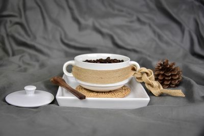 Close-up of coffee cup on table