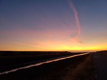 Scenic view of silhouette landscape against sky during sunset