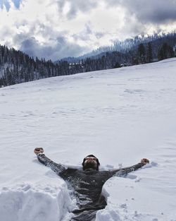 Person on snow covered field