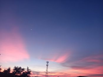 Low angle view of silhouette trees against sky during sunset