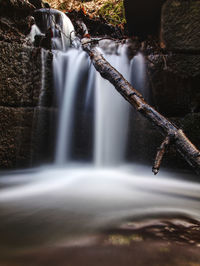 Close-up of waterfall in forest