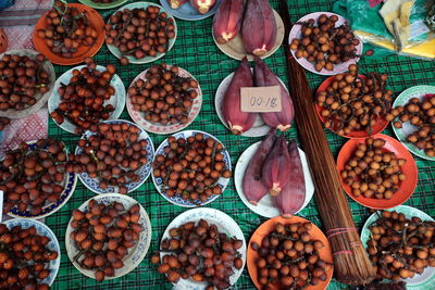 Variety of food for sale at market stall