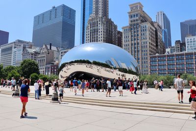 Group of people in city buildings