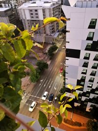 High angle view of street amidst buildings in city