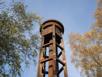 Low angle view of water tower against clear sky