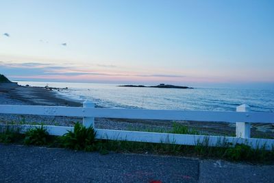 Scenic view of sea at sunset