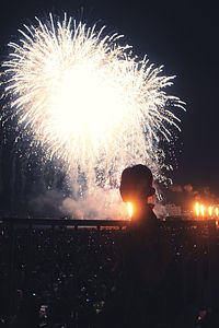 Firework display at night