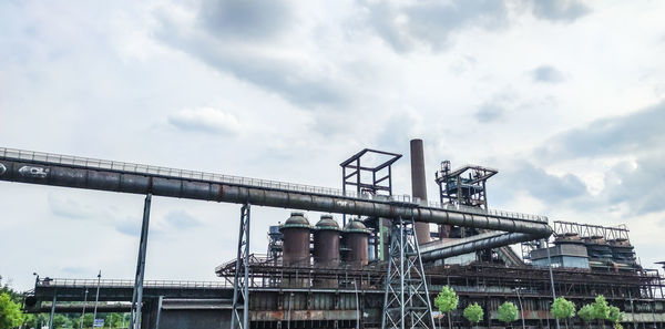 Blast furnace, steel industry with sky and trees