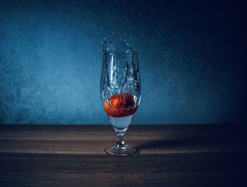 Close-up of wine in glass on table