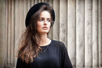 Close-up of a serious woman looking away