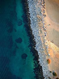 High angle view of surf on beach