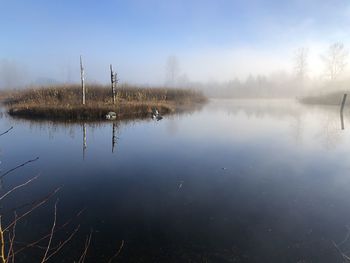 Scenic view of lake against sky