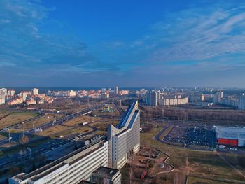 High angle view of buildings in city against sky