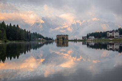 Scenic view of lake against sky during sunset