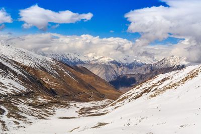 Idyllic shot of snowcapped mountains against sky