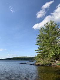 Scenic view of lake against blue sky