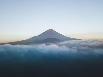 Scenic view of snowcapped mountain against sky