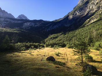 Scenic view of mountains against clear sky