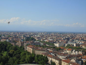 High angle shot of townscape against sky