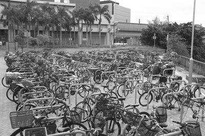 Bicycles on street by building in city