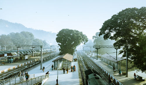 High angle view of people walking on street in city