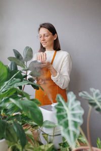 Portrait of woman holding bouquet