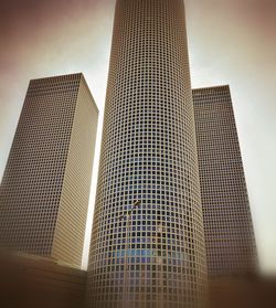 Low angle view of skyscrapers against sky