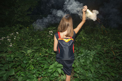 Full length of girl standing outdoors