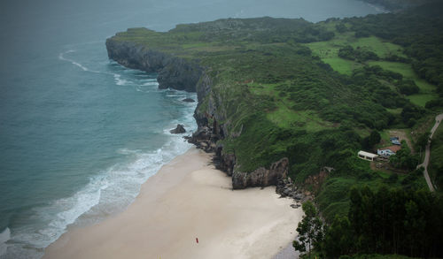 Beach in suances, cantabria, spain from the cliff la roca blanca, the white rock