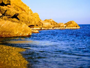 Scenic view of sea against clear sky