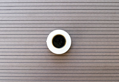 High angle view of coffee cup on table