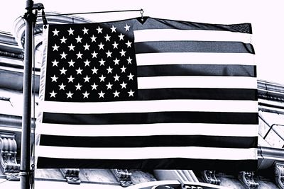 Low angle view of american flag