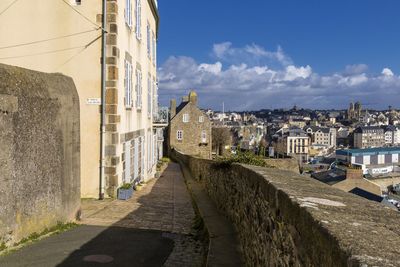 Panoramic shot of cityscape against sky