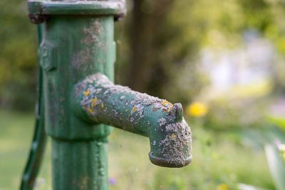 Close-up of rusty water pump