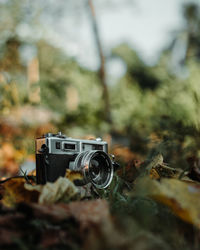 Close-up of camera on field