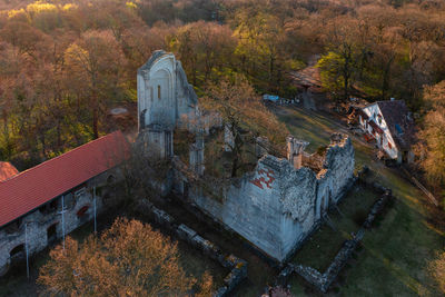 Aerial view about former benedictine monastery and church ruins. romanesque age architecture.