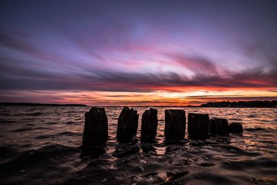 Scenic view of sea at sunset