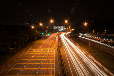 High angle view of light trails at night