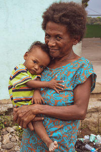 Portrait of mother and baby girl