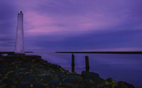 Scenic view of sea against sky at sunset