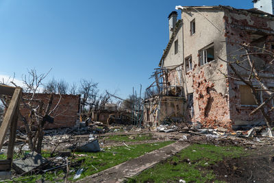 Abandoned building against clear sky