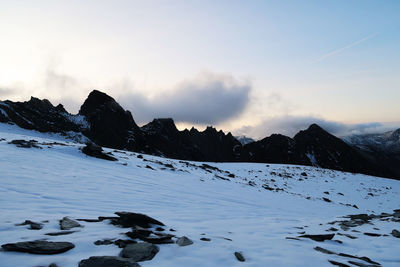 Scenic view of snowcapped mountains against sky