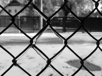 Full frame shot of wet chainlink fence