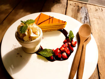 High angle view of fruits in plate on table