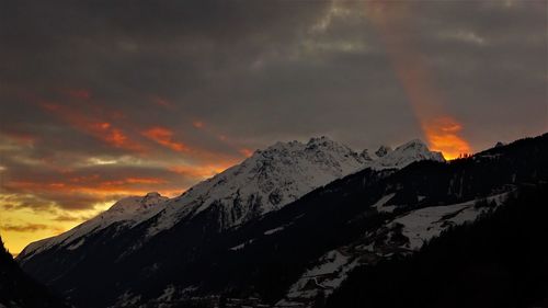 Scenic view of mountains against sky during sunset