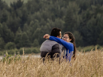 Young couple on field